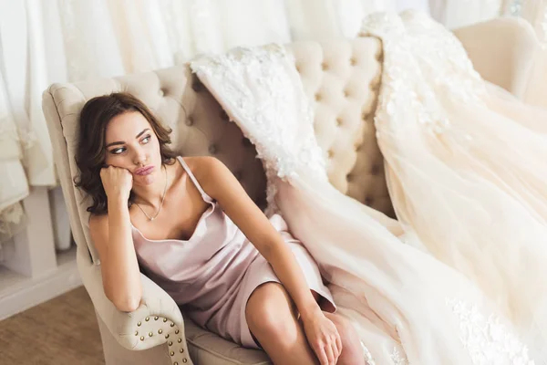 Bored Woman Sitting Sofa Wedding Fashion Shop — Stock Photo, Image