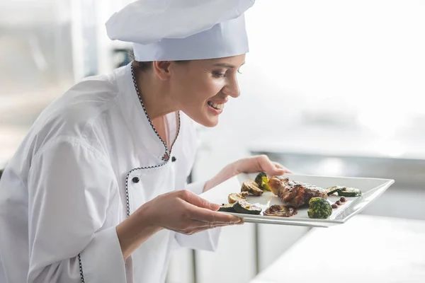 Attractive Chef Sniffing Cooked Steak Restaurant Kitchen — Stock Photo, Image