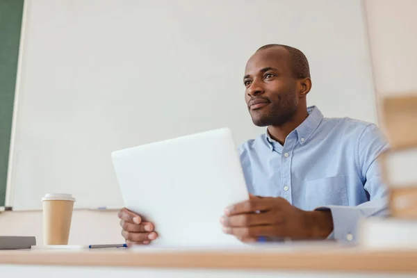 Low Angle View African American Teacher Sitting Desk Laptop Coffee — Stock Photo, Image