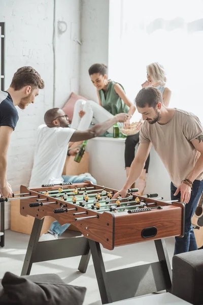 Two Young Men Playing Table Football While Friends Watching Beer — Stock Photo, Image