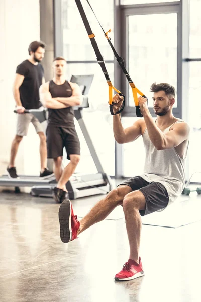 Handsome Muscular Young Man Training Resistance Bands Sports Center — Stock Photo, Image