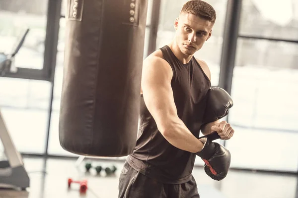 Athletic Young Man Sportswear Wearing Boxing Gloves Looking Punching Bag — Stock Photo, Image