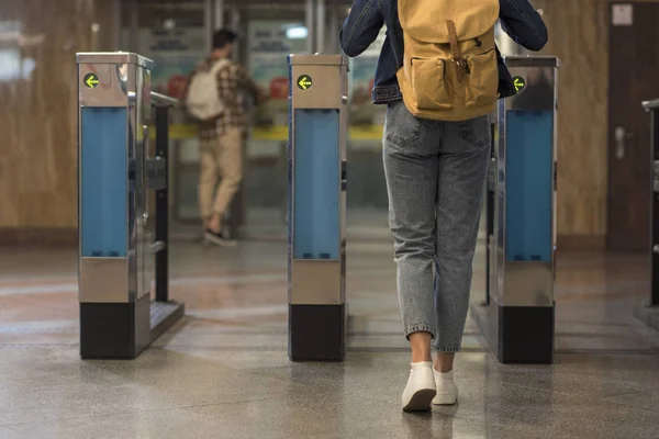 Cropped Shot Female Stylish Traveler Backpack Passing Turnstiles Male Tourist — Stock Photo, Image