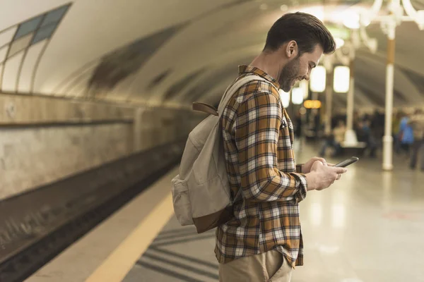 Side View Smiling Man Backpack Typing Smartphone Subway Station — Stock Photo, Image