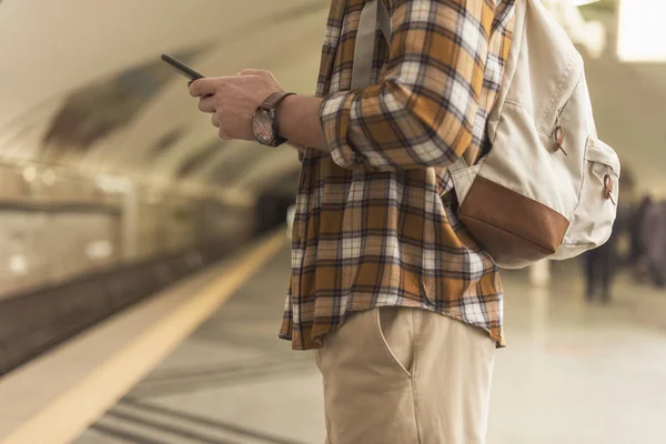 Cropped Shot Man Backpack Smartphone Subway Station — Stock Photo, Image