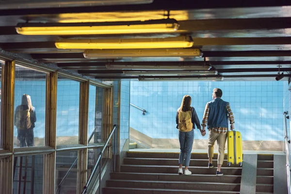 Rear View Stylish Couple Backpack Wheeled Bag Going Upstairs Subway — Stock Photo, Image