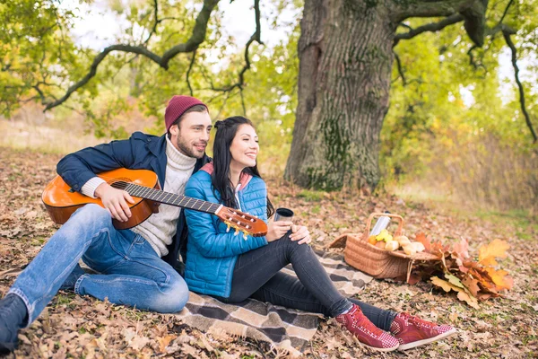 Romantic couple in autumn forest — Stock Photo