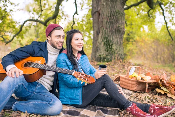 Romantic couple in autumn forest — Stock Photo