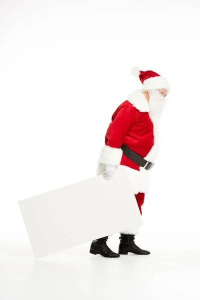 Santa Claus pulling white board — Stock Photo