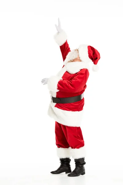 Santa Claus señalando hacia arriba - foto de stock