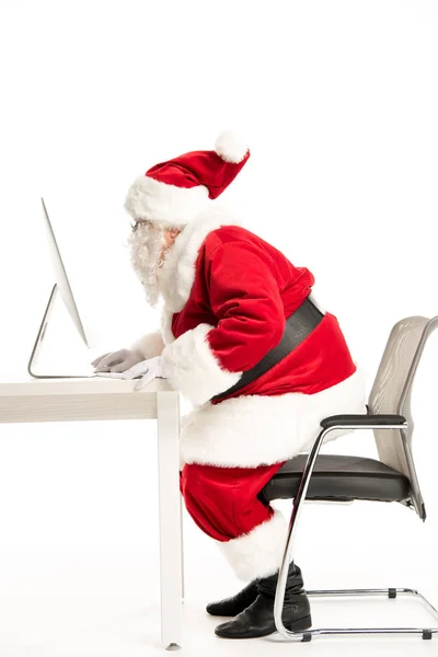 Weihnachtsmann mit Computer — Stockfoto