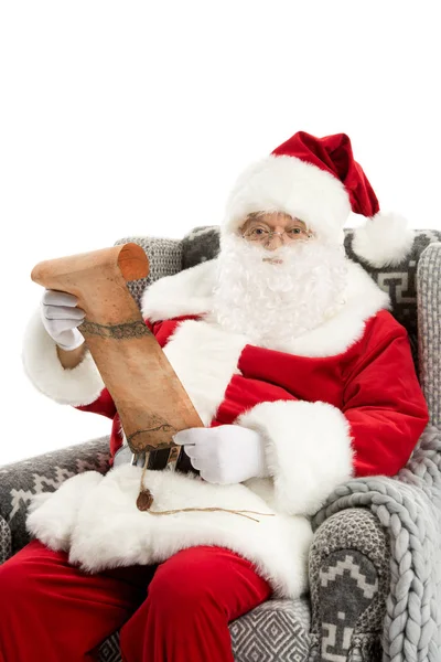 Santa Claus reading wishlist — Stock Photo