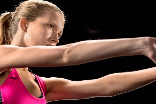 Athletic woman exercising — Stock Photo