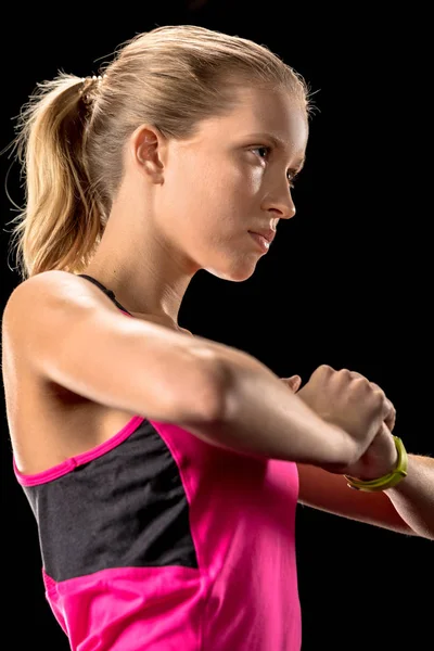 Athletic woman exercising — Stock Photo