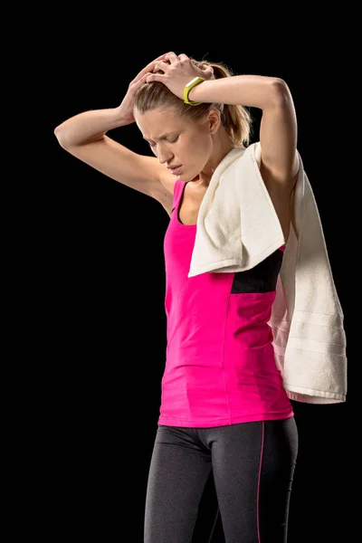 Upset sportswoman with towel — Stock Photo