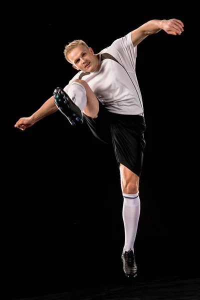 Joueur de football en uniforme — Photo de stock