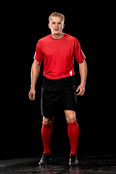 Jugador de fútbol en uniforme - foto de stock