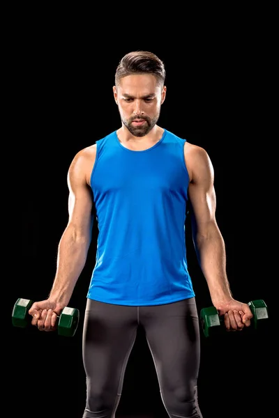 Sportive man with dumbbells — Stock Photo