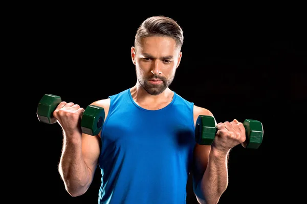 Sportive man with dumbbells — Stock Photo