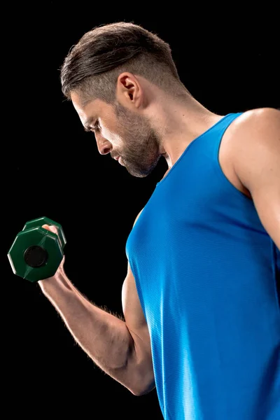 Sportive man with dumbbell — Stock Photo