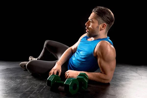 Sportive man with dumbbells — Stock Photo
