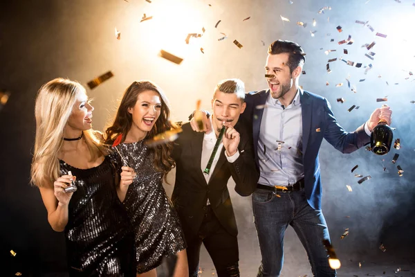 Happy friends celebrating — Stock Photo