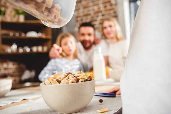 Pouring corn flake rings — Stock Photo