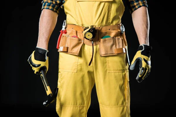 Workman in tool belt — Stock Photo