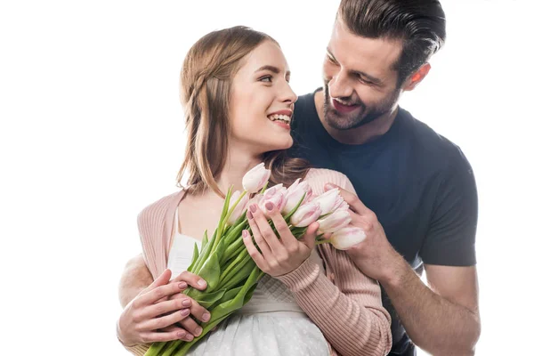 Pareja joven y flores - foto de stock