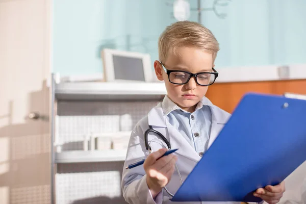 Little boy pretending to be doctor — Stock Photo