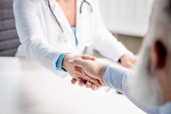 Doctor and senior patient — Stock Photo