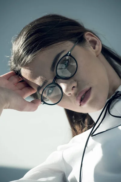 Stylish hipster woman in glasses — Stock Photo