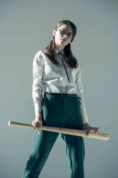 Hipster woman holding baseball bat — Stock Photo