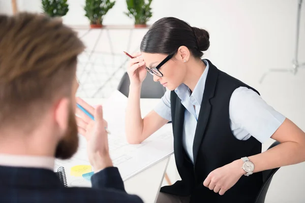 Tired young businesswoman — Stock Photo