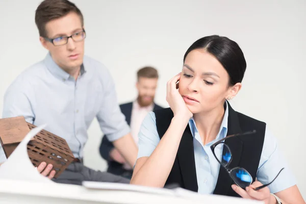 Tired young businesswoman — Stock Photo