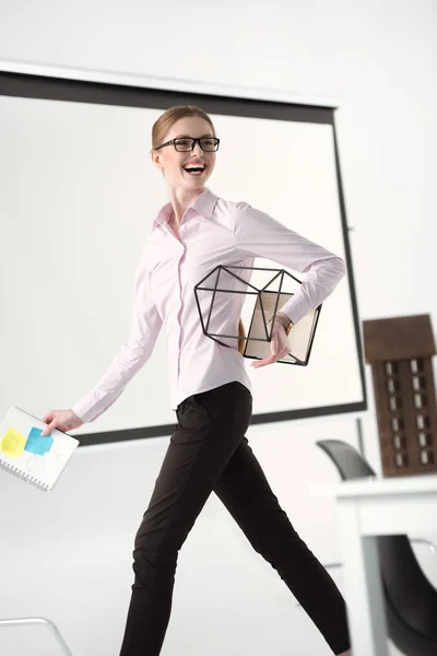 Young businesswoman in office — Stock Photo