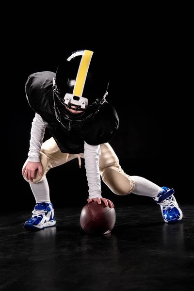 Boy playing american football — Stock Photo