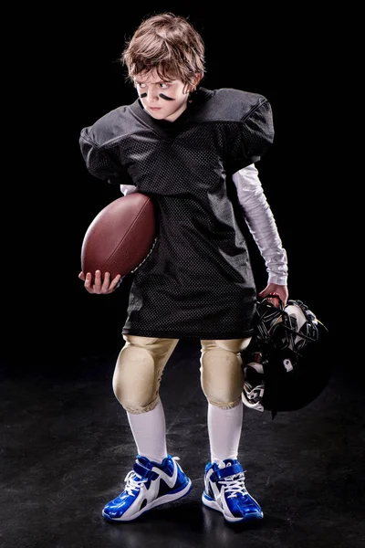 Boy playing american football — Stock Photo