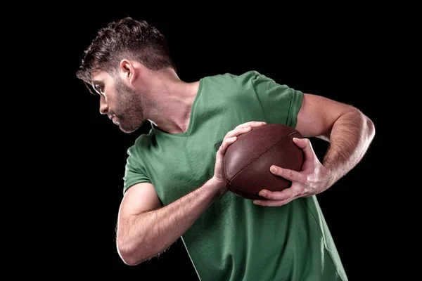 Homem com bola de rugby — Fotografia de Stock