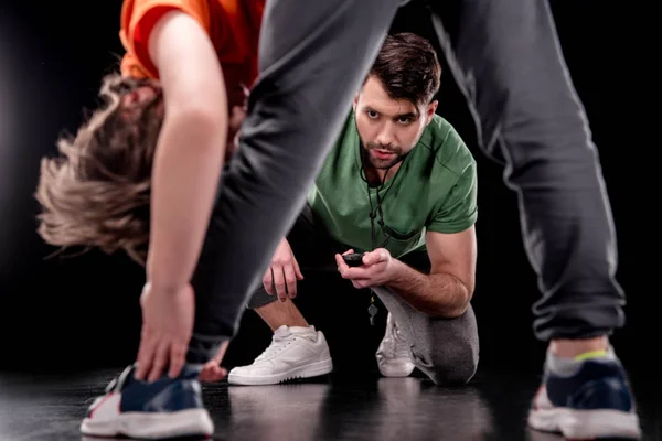 Man and boy training together — Stock Photo