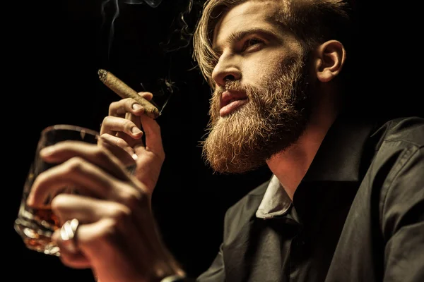 Man smoking cigar — Stock Photo