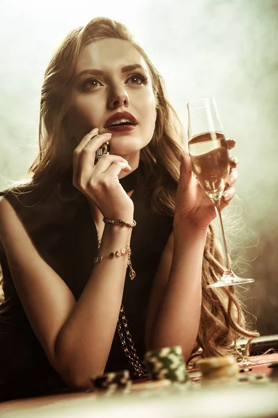 Woman holding drink — Stock Photo