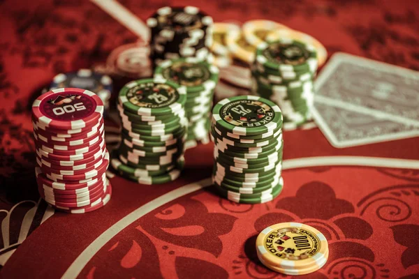 Poker chips on table — Stock Photo