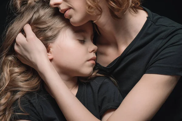 Daughter and mother hugging — Stock Photo