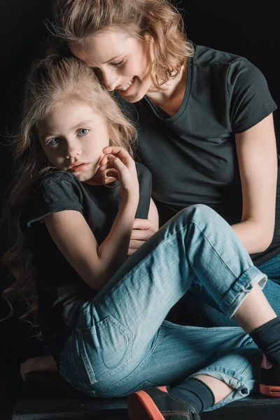 Stylish mother and daughter — Stock Photo