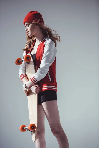 Hipster woman with longboard — Stock Photo