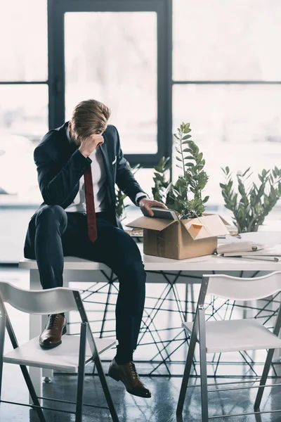 Young fired businessman — Stock Photo