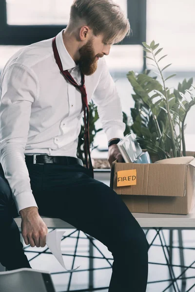 Young fired businessman — Stock Photo