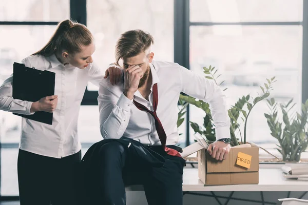 Young fired businessman — Stock Photo