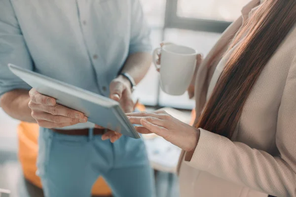 Business people with digital tablet — Stock Photo